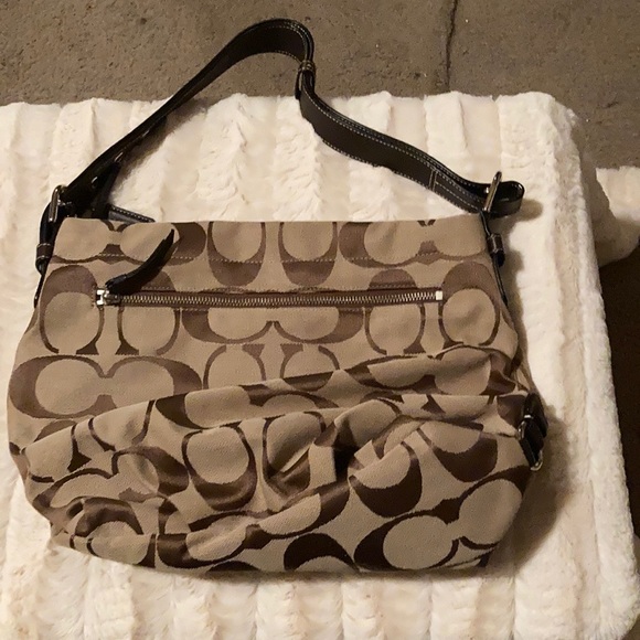 A medium size coach bag, tan and brown - Picture 1 of 3